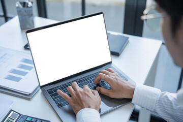 Successful Businessman Using Laptop in Modern Office.