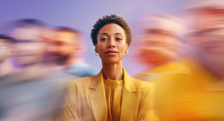 Calm and composed African woman centered in moving crowd with bright yellow and purple tones