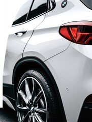 Fototapeta premium Close-up of a white SUV's rear quarter