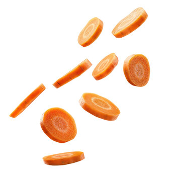 Sliced carrots floating in the air against a transparent background