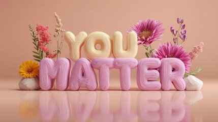 Bright and colorful decoration with flowers and textured letters expressing a positive message in a serene setting