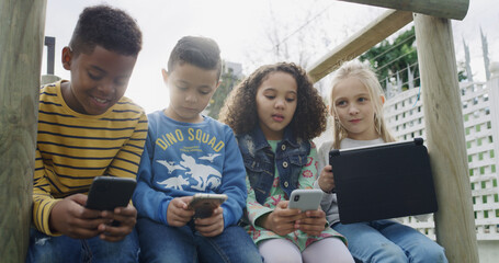 People, kids or playground with technology for anti social interaction or virtual stimulation. Children, group or friends with tablet, phone or app for emotional distraction or childhood development