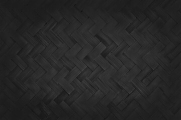 Black weave bamboo pattern, woven rattan mat texture for background and design art work.