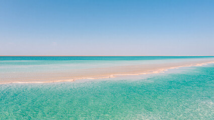 Stunning tropical shoreline under a bright blue sky