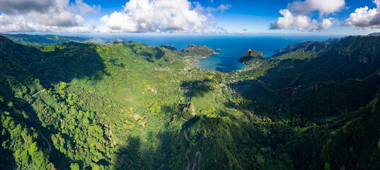 Magnificent aerial view of the bottom of the HANE and HOKATU valleys on the island of UA HUKA in the Marquesas archipelago in French Polynesia