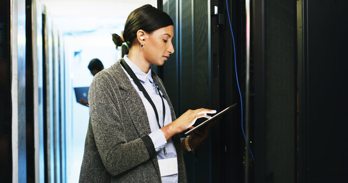 Woman, engineer and tablet in server room for software, update system and diagnostics repair. Programmer, digital and IT inspection of technical engineering, network security and hardware maintenance