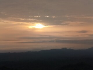 Serene Sunset Over Misty Mountains A Breathtaking View