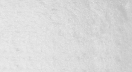 Macro shot white bread slice. Textured surface bread's interior, showing its porous, airy structure. The lighting soft and texture and  clean inviting feel