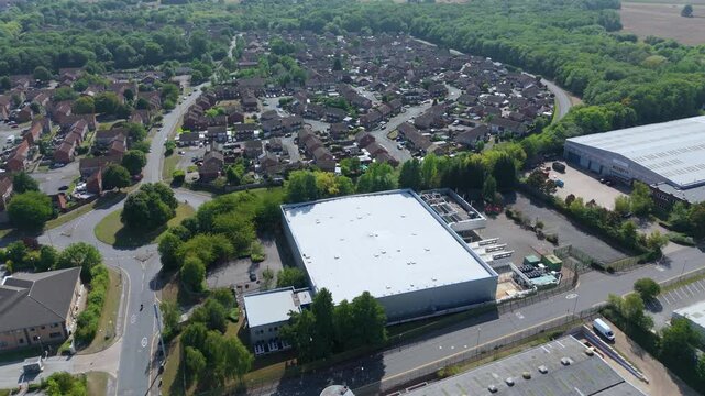 Aerial drone view of large data centre center, quantum computing and information hub, cooling fans in Nottingham England UK