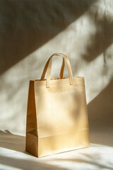 Kraft paper bag standing on a neutral fabric background