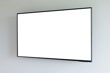 Blank flat screen TV mounted on wall with white screen
