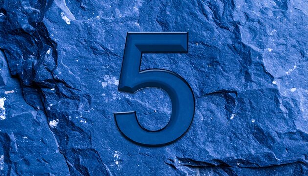 Number five on dark blue rock