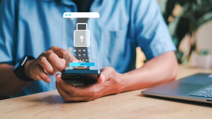 Close-up of a man using smartphone with virtual password input and login button. Concept of secure mobile authentication, user access control, and cybersecurity protection.