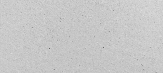 White recycled cardboard texture background. Clean white paperboard texture for packaging and design concepts. Soft paper natural style.