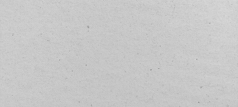 White recycled cardboard texture background. Clean white paperboard texture for packaging and design concepts. Soft paper natural style.