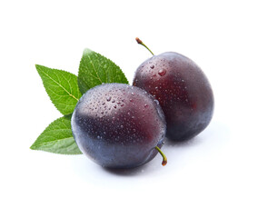 Sweet plums fruits with water drops on white backgrounds