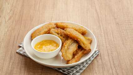 Fried banana with kaya jam or pisang goreng selai srikaya, Indonesian food
