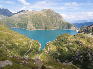 Lac d'Emosson, Switzerland - September 1st 2024: Beautiful view over the barrier lake surrounded by alpine landscape