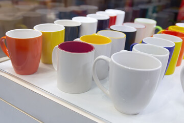 Mugs stall in a store close-up