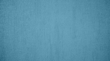 Blue color textured background. Texture of small dots and lines. Blur the background at the edges. Central part of the background is clear. Fabric, wallpaper, material. Different shades