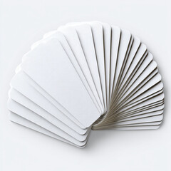 Stack of flashcards fanned in a semicircle, index corner tabs showing alphabet or numbers, slightly curled corners, high-res paper texture, flat lay view, isolated transparent background