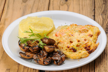 Grilled omelette and mushrooms macro photo