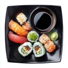 A black plate with sui and sauce on it