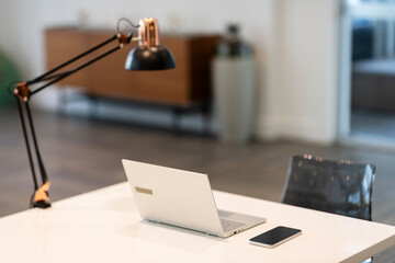 Corporate working space, paperwork. Laptop table. Corporate business workplace. Selective focus. Modern workspace with laptop copy space. Business office. Open space office. Working office interior