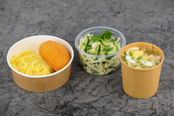 lunch soup salad and side dish with meat