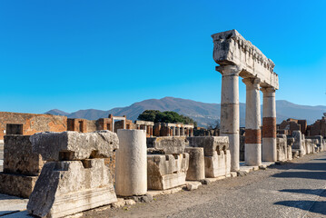 The Forum in Pompeii was the city's main square and a central hub for public life. It served as a focal point for political, religious, and commercial activities
