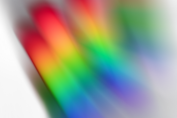 light leak overlay effect with blur rainbow light leaks,retro noisy film texture light leak flare on black background,abstract colorful background