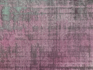 Close up texture of purple and grey upholstery fabric, made of woven cotton and polyester. Micro linen texture. Suitable for upholstery and carpet rug. Seamless background texture