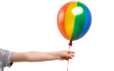 Childs Hand Reaches Toward a Floating Rainbow Colored Balloon in the Sky Isolated on Transparent Background