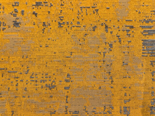 Abstract texture in random grunge and dirt ornamental pattern. With golden brown color.