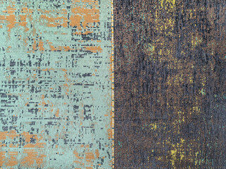 Abstract vintage weathered texture in random grunge and dirt ornamental pattern. With light blue, black, and gold rust color. Seamless background texture.