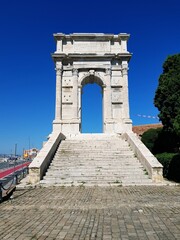 The ancient stone triumphal arch of Emperor Trajan in Ancona, Italy