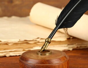 Antique quill pen resting on aged parchment