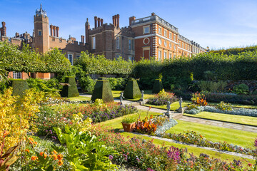 Sunken gardens of Hampton Court Palance and set against its Georgian and Tudor facades