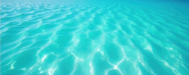 Obraz premium Serene Turquoise Ocean Water Perfect Summer Vacation Backdrop for Websites, Travel Brochures, and Presentations