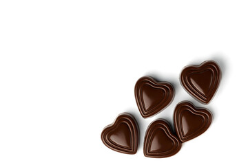 Fototapeta premium Heart shaped dark chocolates on white background, sweet dessert candy, gourmet cocoa treat, luxury confectionery, romantic gift, Valentine’s Day love symbol, indulgent food concept, delicious chocolat