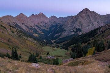 Mountain valley vista at dawn.  Autumn foliage