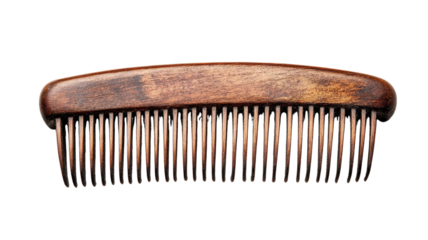 A wooden comb lies flat, showcasing its unique texture and quality craftsmanship
