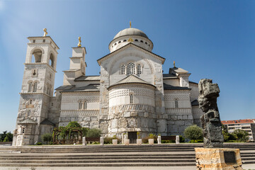 Obraz premium Cathedral of the Resurrection of Christ with bronze sculpture in front, Podgorica, Montenegro