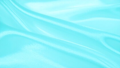 Soft, flowing light teal fabric with subtle folds and ripples