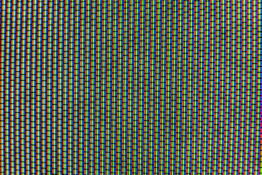 Analog TV Screen Close Up Texture. RGB dots seamless pattern, revealing digital display structure through vibrant red, green, blue color fragments - Powered by Adobe