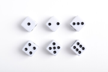 Six clean dices with Numbers 1, 2, 3, 4, 5, 6, isolated on white background, top view