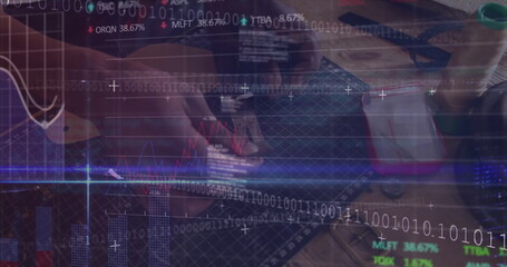 Soldering man assembling circuit board with soldering iron at electronics bench with data overlay