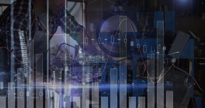 Adjusting technician wearing apron twisting lever on machine in workshop with market data overlay