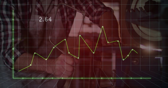 Leaning mechanic in plaid shirt adjusting engine block on garage bench, with wrench and grid 2