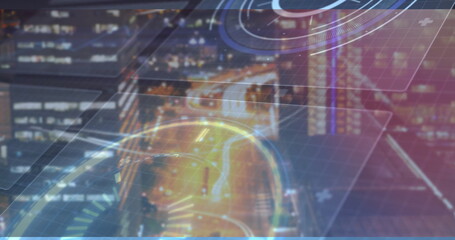 Showing night city traffic from aerial view, with HUD grid overlays plus symbols and data readouts